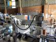 Automatic labeling machine for flat cylindrical bottles and jars Maqmundi