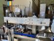Automatic labeling machine for flat cylindrical bottles and jars Maqmundi
