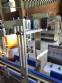 Automatic labeling machine for flat cylindrical bottles and jars Maqmundi