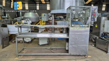 Engemaq automatic sealer for jars, bottles, and cups with plastic seal, 900 jars per hour.