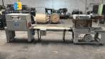 Automatic L-sealer with shrink tunnel.