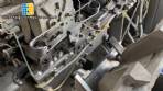 Tetra Pak A3 aseptic filling machine with cardboard packer 70 and tray shrink 51.