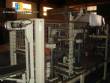 Linear filling machine with thermoforming