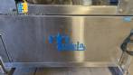 Automatic self-adhesive labeling machine for cylindrical bottles