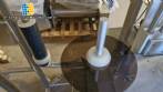 Automatic self-adhesive labeling machine for cylindrical bottles