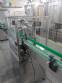 Linear filling machine with 12 filling nozzles