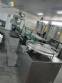 Linear filling machine with 12 filling nozzles