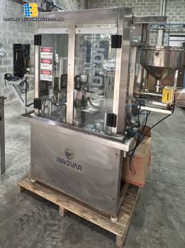 Innovar Rotary dosing and filling machine with sealer and capper for jars, cups, and bottles
