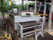 Conveyor oven with direct flame