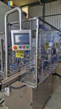 Complete filling line with Tecman Nelpas Tecnoenvase Tudela bottle filling, labeling, capping, and positioning machines for cosmetic liquids.