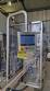 Complete filling line with Tecman Nelpas Tecnoenvase Tudela bottle filling, labeling, capping, and positioning machines for cosmetic liquids.