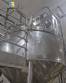 Stainless steel surge tank with agitator, 2000 liters.