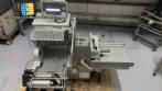 Bizerba automatic stainless steel slicer for cheeses, cold cuts, sausages, and meats.