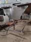 Stainless steel conveyor table with belt for accumulation assembly