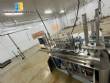 Automatic stainless steel filling machine for a�a� jars, Bramak ice cream