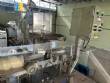Packaging line with IMSB bung capper, Maqmundi labeler and accumulator table