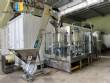 Packaging line with IMSB bung capper, Maqmundi labeler and accumulator table