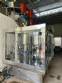 Stainless steel rotary filling machine with 16 IMSB nozzles for bottles and jars