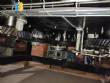 Gravimetric rotary filling machine in stainless steel with cabin