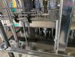 Gravimetric rotary filling machine in stainless steel with cabin