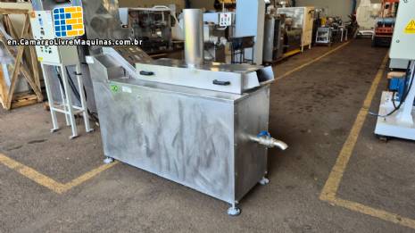 MCI continuous electric deep fryer, made of stainless steel, with a capacity of 4,000 units/hour