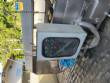 Filling line for 10 and 20 liter gallon jugs with filling machine and rinser/washer.