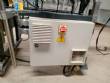 Automatic labeler for flat bottles