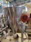 Vertical wrapping machine for triangular format