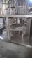 Filling line and integrated Capper pots to margarine, butter, vegetable cream
