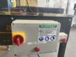 Adhesive tape case sealer with safety enclosure and door sensors Strapack