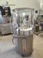 Bottle and jar screwing machine with automatic cap feeding system