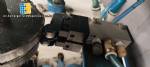 Bottle and jar screwing machine with automatic cap feeding system