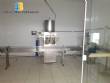 Linear filling machine with 14 nozzles with rinser and screw capper