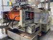 Blowing machine for HDPE bottles