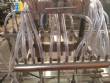 Vacuum filling machine with 12 nozzles Erli