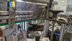 Automatic stainless steel labeling machine with two heads for Narita self-adhesive labels