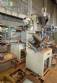 Packaging machine for powder and grain products