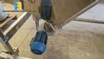 Inclined screw conveyor with stainless steel silo