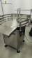 Rotary filling line for dropper bottles with Certo cylindrical self-adhesive labels