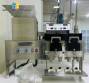 Capsule encapsulator, counter and polisher, capacity 22,000 capsules per hour.