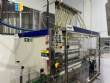 Gravimetric filling machine and threading machine in stainless steel Robopac IMSB