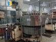 CompoMaq rotary filling machine with 42 nozzles and screw capper