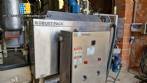 Labeling machine with steam sleeve tunnel and bottle baler