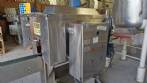Labeling machine with steam sleeve tunnel and bottle baler