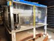 Zegla rotary filling machine with rinser and three-block capping system.