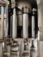 Zegla rotary filling machine with rinser and three-block capping system.