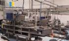 Automatic filling and sealing machine for gelatin cups, 12,000 units/hour.