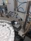 Filling line with capsule counter and screw machine