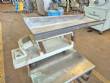 Vibrating trough for multi-head scale