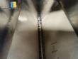 Stainless steel bagging storage silo with screw conveyor outlet